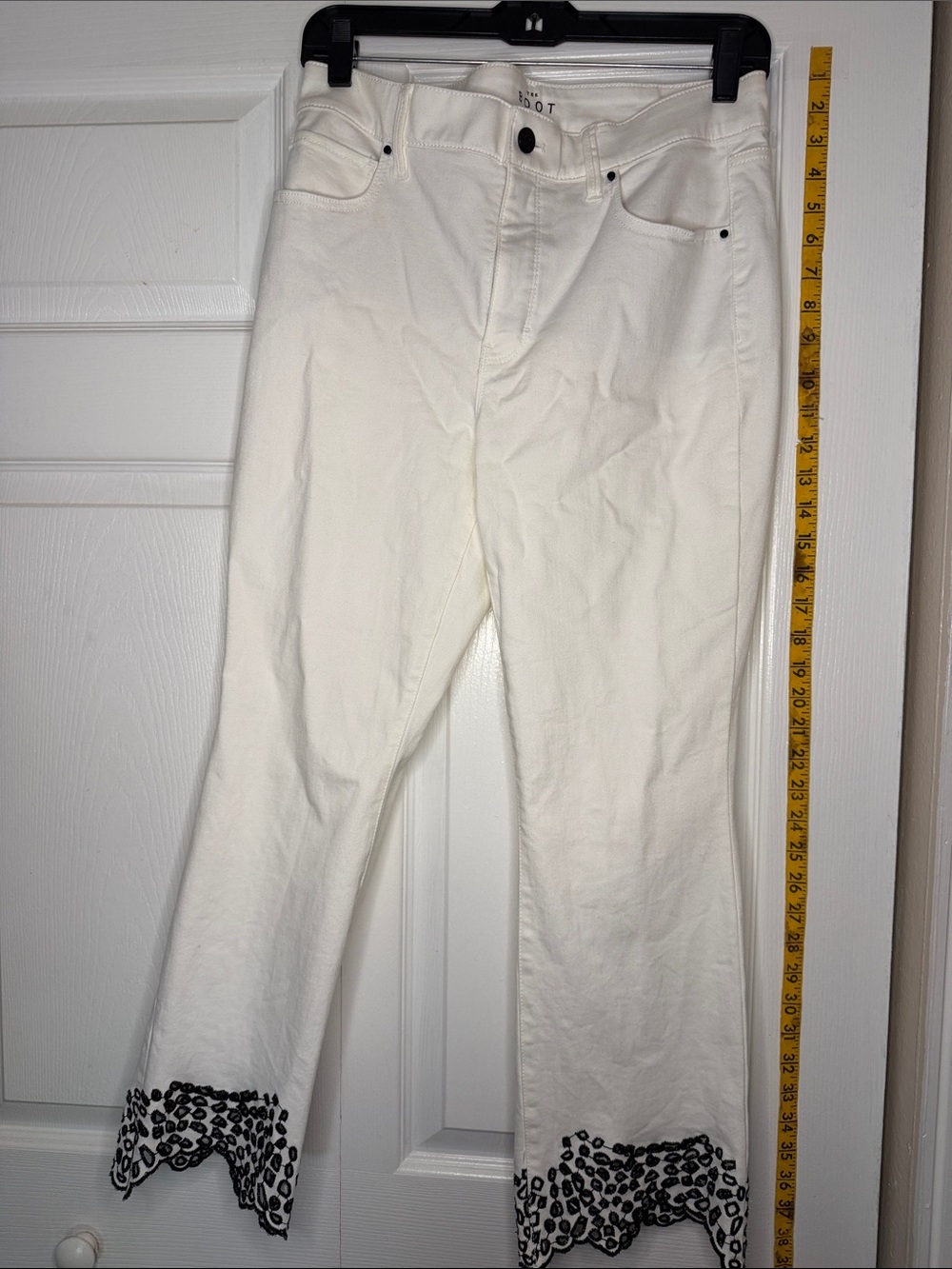 White House Black Market White Cropped Jeans with Black Embroidered Hem